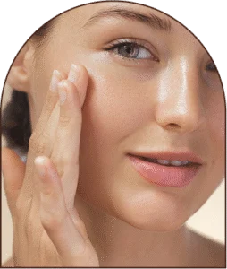 Applying facial cream before light therapy session Applying facial cream before light therapy session
