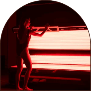 Woman preparing for full-body red light therapy in Ireland Woman preparing for full-body red light therapy in Ireland
