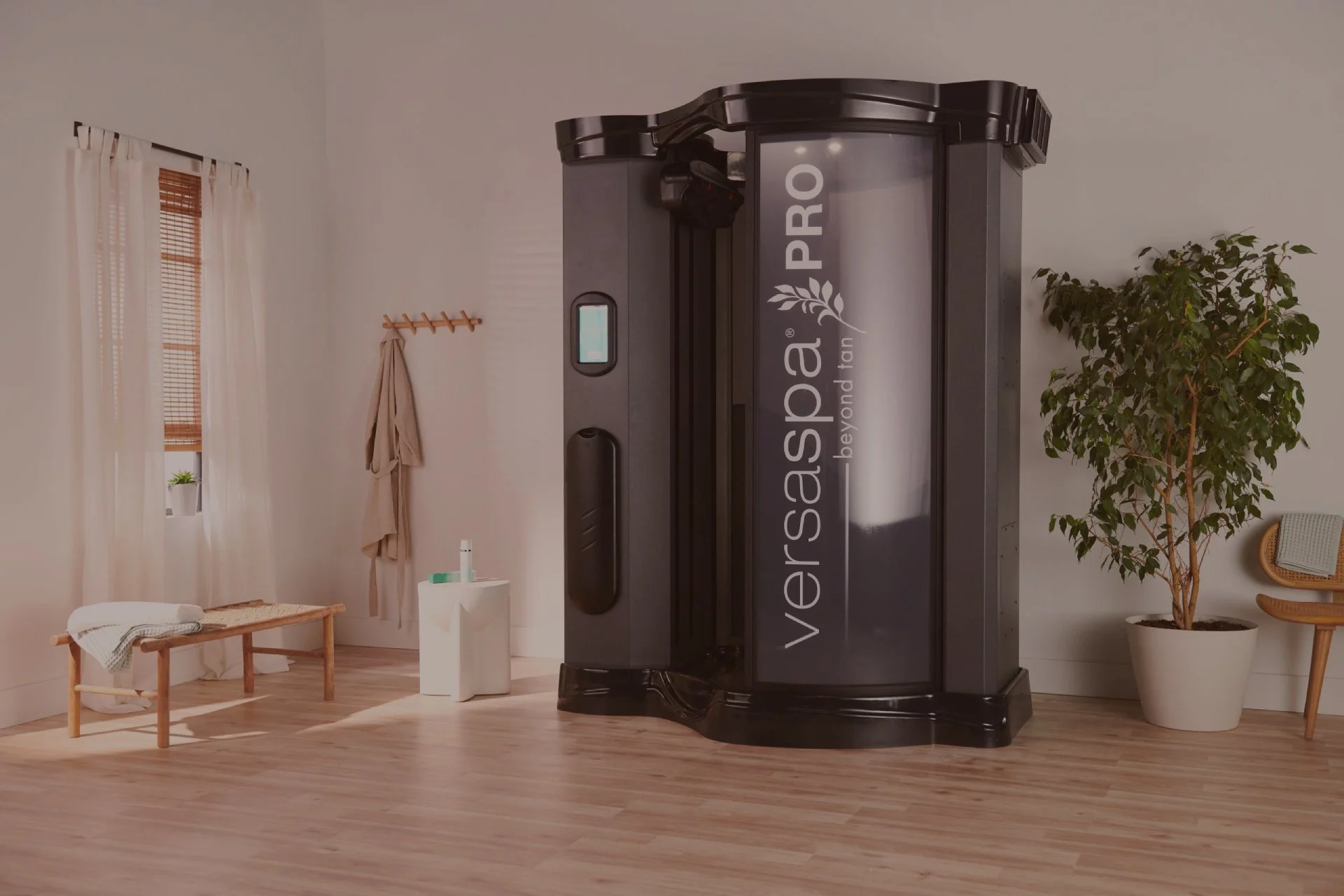 WellFit Spray-On Skincare Booth in a warm, welcoming salon environment. WellFit Spray-On Skincare Booth in a warm, welcoming salon environment.