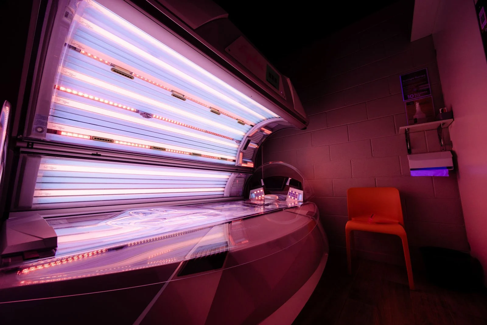 Premium lie-day sunbed at The Tanning Shop Ireland with cleaning products available.