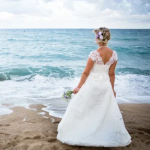 Beautiful,bride,in,long,white,lace,wedding,dress,standing,on Beautiful,bride,in,long,white,lace,wedding,dress,standing,on