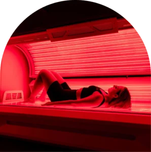 The Tanning Shop Ireland customer reclined in a full-body red light therapy bed