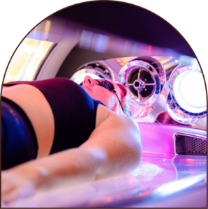 The Tanning Shop Ireland customer using a premium UV tanning bed and wearing eye protection The Tanning Shop Ireland customer using a premium UV tanning bed and wearing eye protection